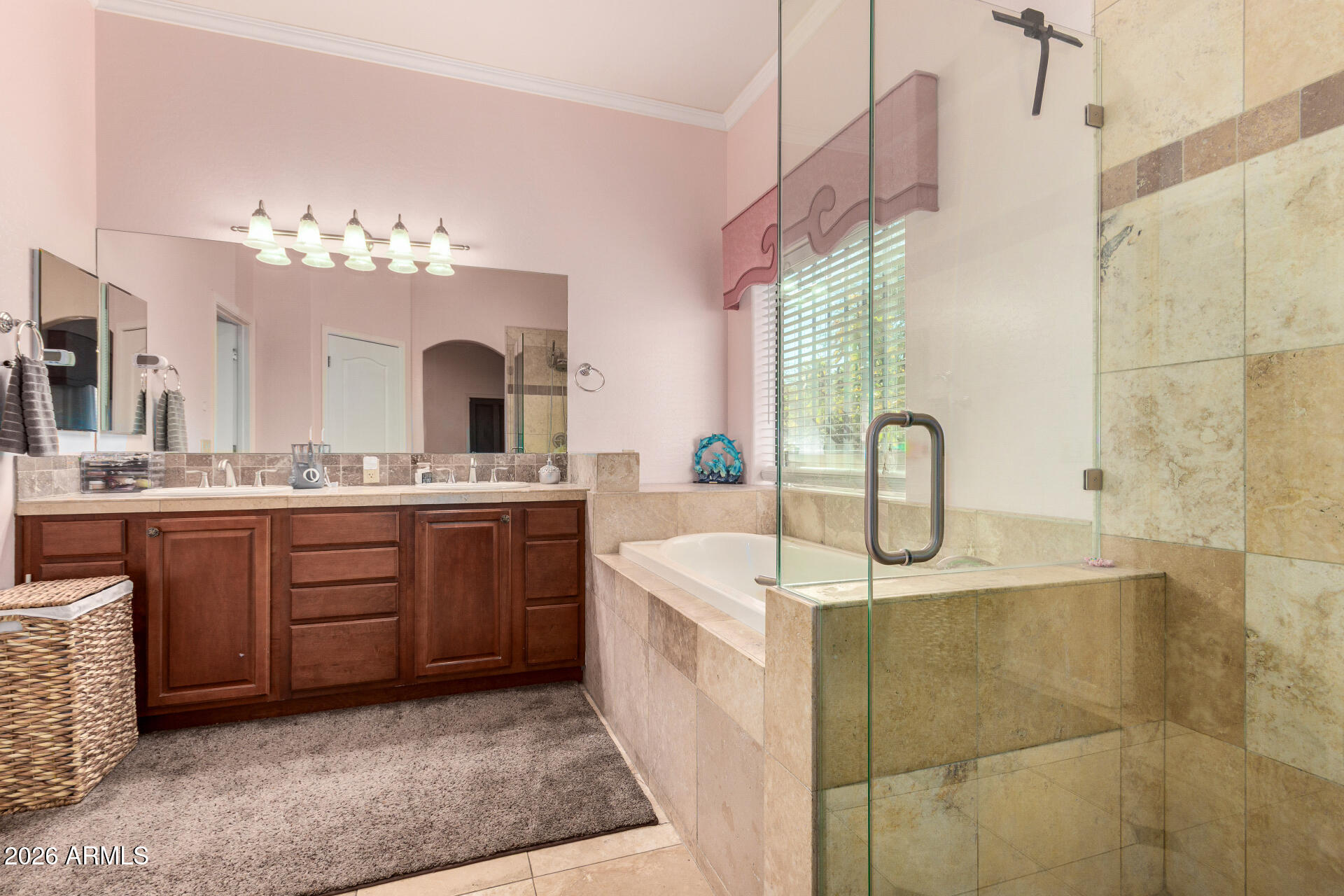 8912 North 15th Lane Phoenix, AZ 85021 - Photo 23 of 36 a spacious bathroom with a sink a vanity a mirror and bathtub