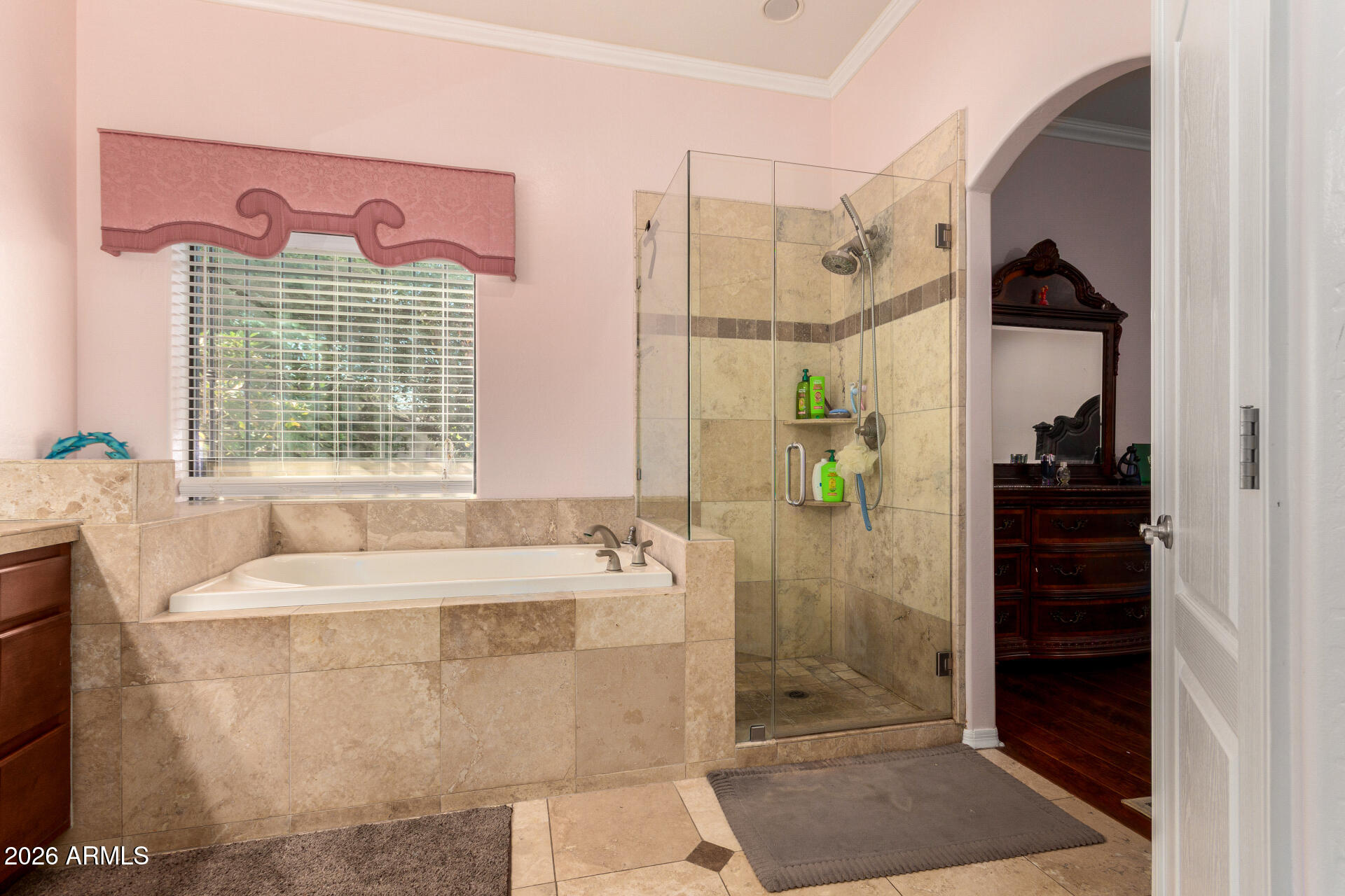 8912 North 15th Lane Phoenix, AZ 85021 - Photo 24 of 36 a bathroom with a bathtub sink and mirror