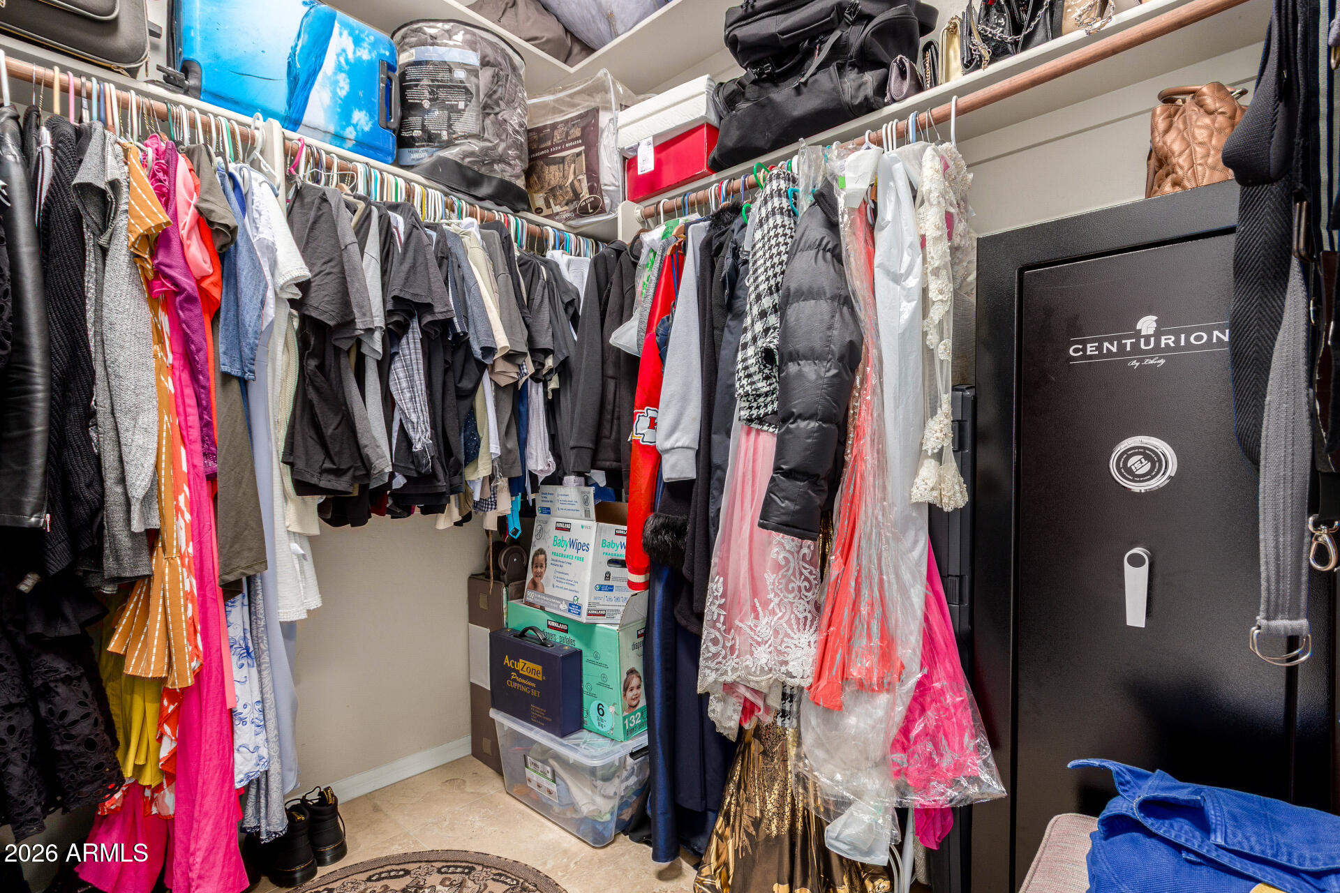 8912 North 15th Lane Phoenix, AZ 85021 - Photo 25 of 36 a view of walk in closet with clothes