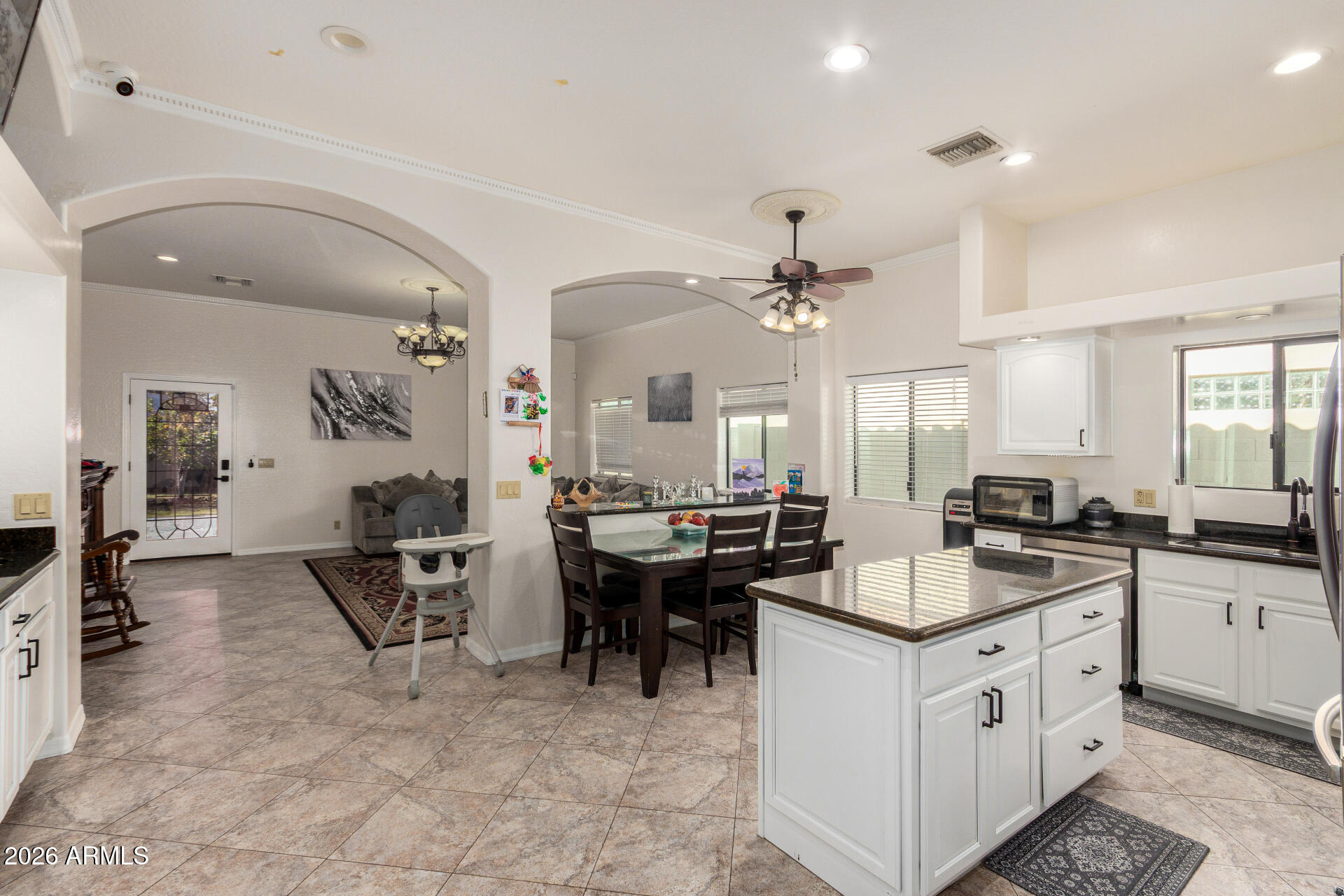 8912 North 15th Lane Phoenix, AZ 85021 - Photo 32 of 36 a kitchen with counter top space appliances and cabinets