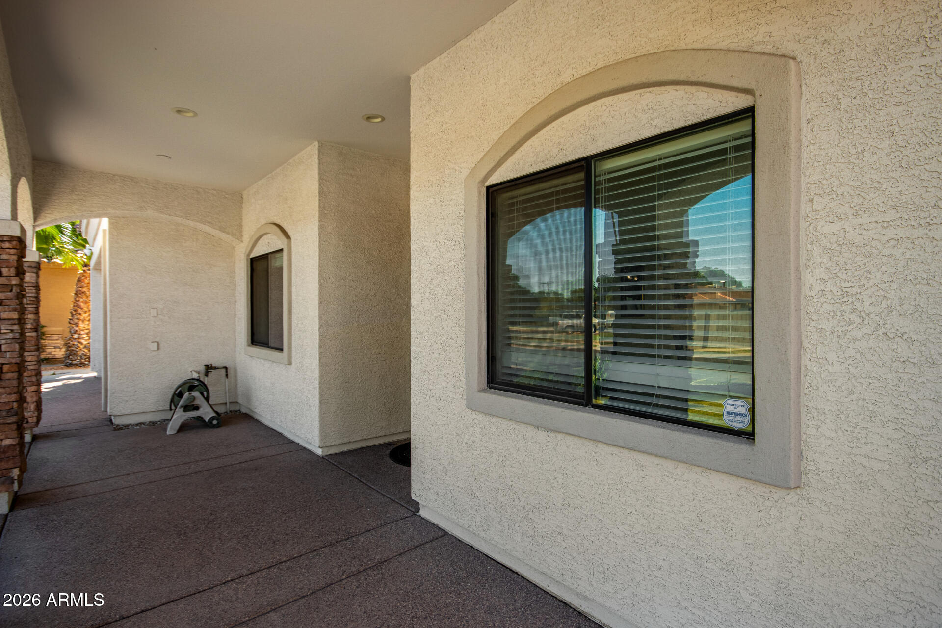 8912 North 15th Lane Phoenix, AZ 85021 - Photo 4 of 36 a view of a room that has a bed and a window
