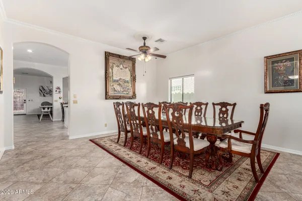 a view of a chairs and table in a room