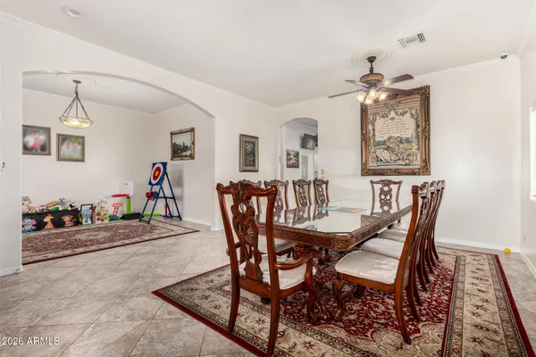 a view of a dining room with furniture