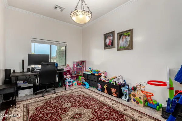 a room with toys and a wooden floor