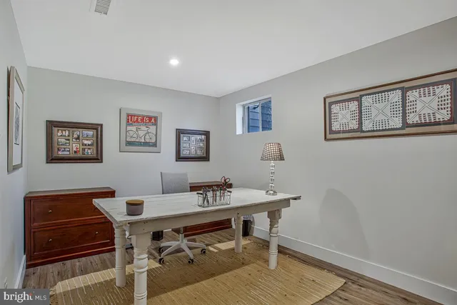 a view of a workspace with furniture