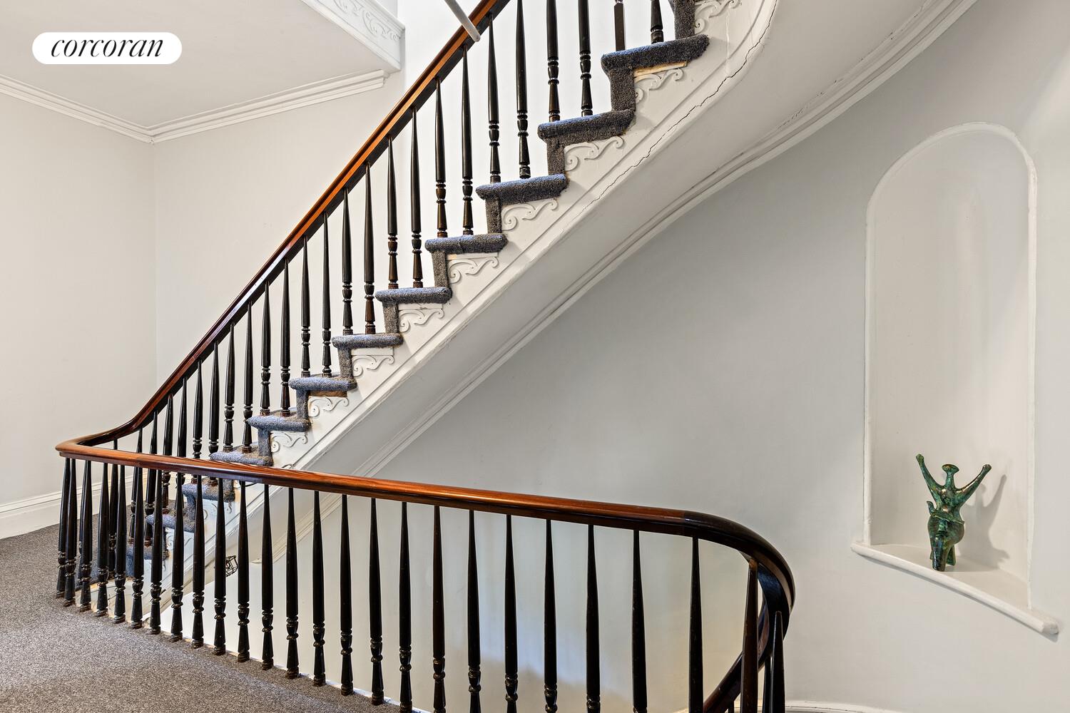 122 State Street Brooklyn, NY 11201 - Photo 13 of 26 a view of staircase with railing and white walls