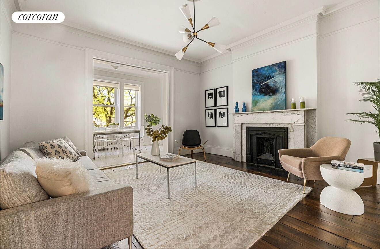 122 State Street Brooklyn, NY 11201 - Photo 14 of 26 a living room with furniture and a fireplace