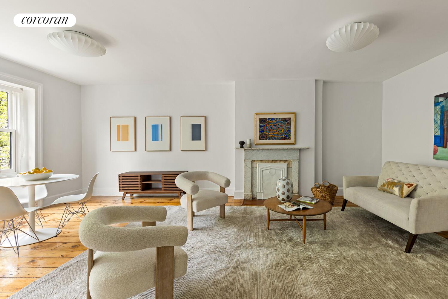 122 State Street Brooklyn, NY 11201 - Photo 19 of 26 a living room with furniture and a couch