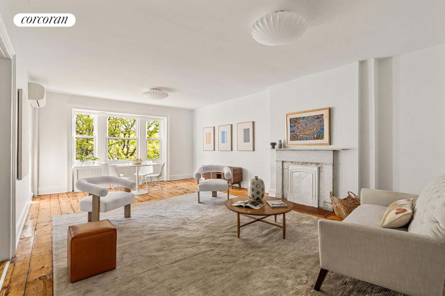 122 State Street Brooklyn, NY 11201 - Photo 20 of 26 a living room with furniture and a large window