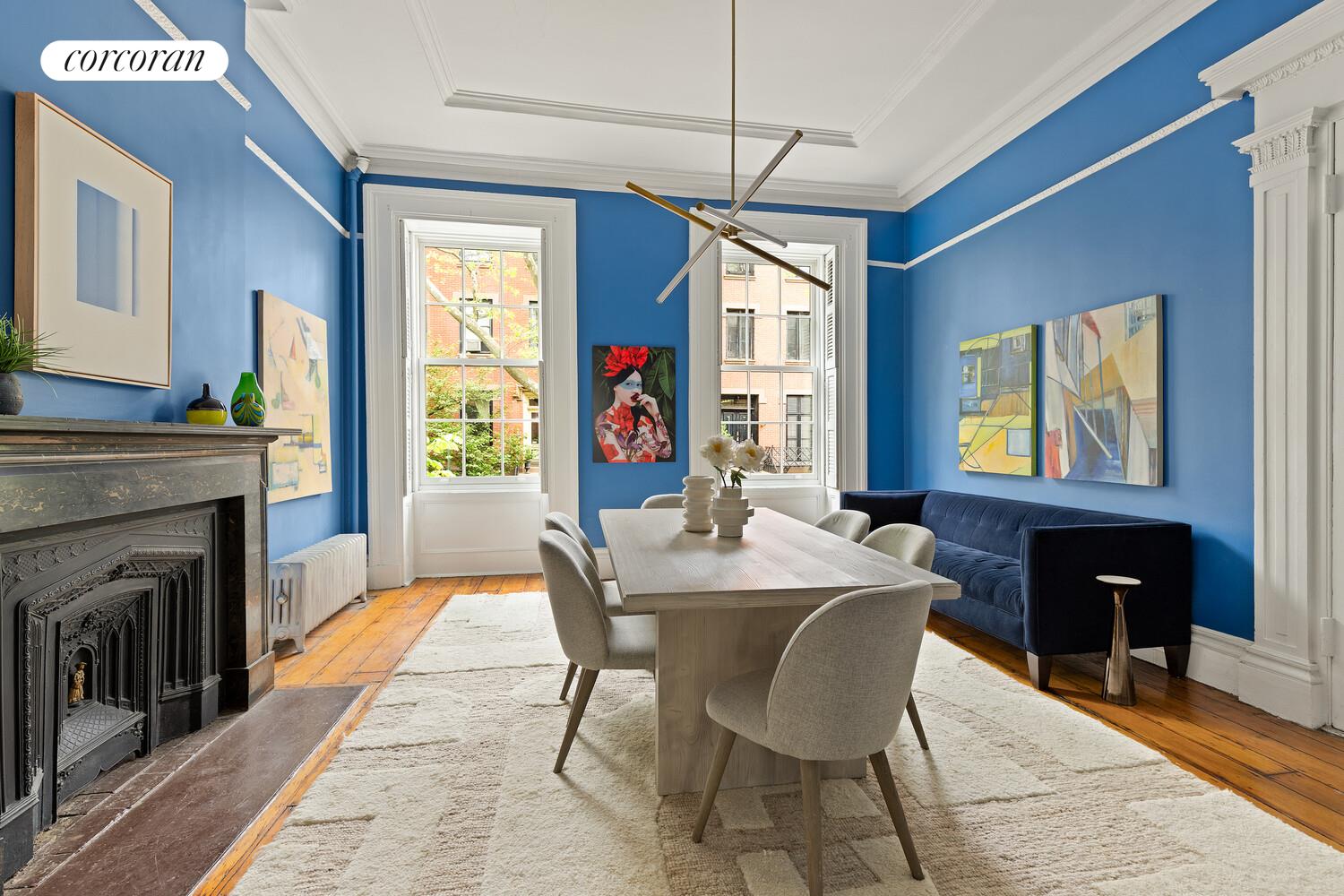 122 State Street Brooklyn, NY 11201 - Photo 3 of 26 a view of a dining room with furniture window and wooden floor