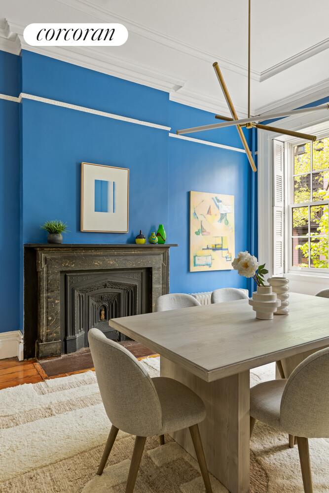 122 State Street Brooklyn, NY 11201 - Photo 4 of 26 a view of a dining room with furniture window and wooden floor