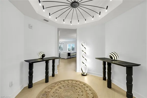 a view of entryway with livingroom