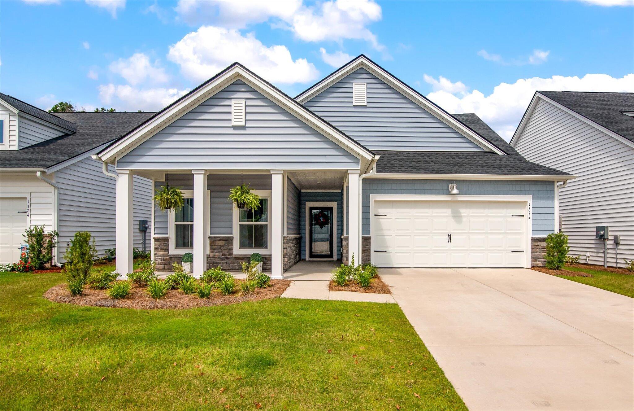 1372 Locals Street Ridgeville, SC 29472 - Photo 1 of 32 01-1372 Locals_e_Lowcountry_Exposure-10