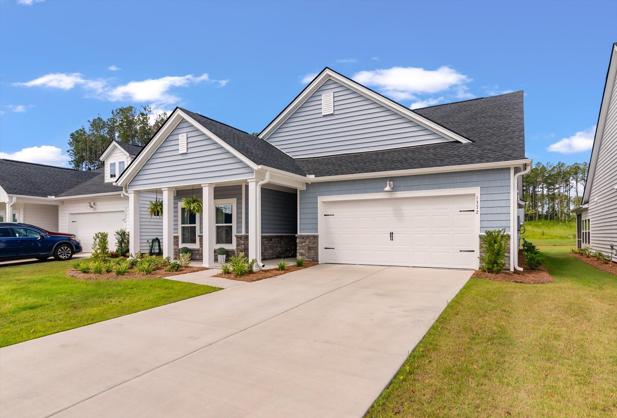 1372 Locals Street Ridgeville, SC 29472 - Photo 2 of 32 02-1372 Locals_e_Lowcountry_Exposure-2
