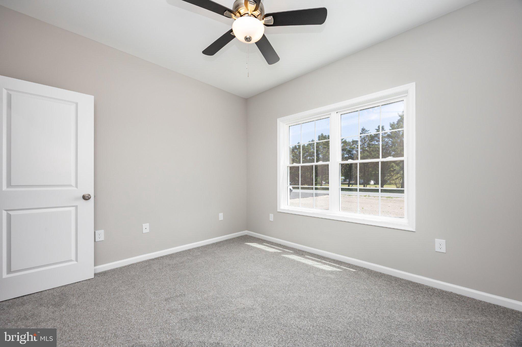 14949 Shiloh Church Road Laurel, DE 19956 - Photo 24 of 32 Bright and airy 3rd bed with natural light.