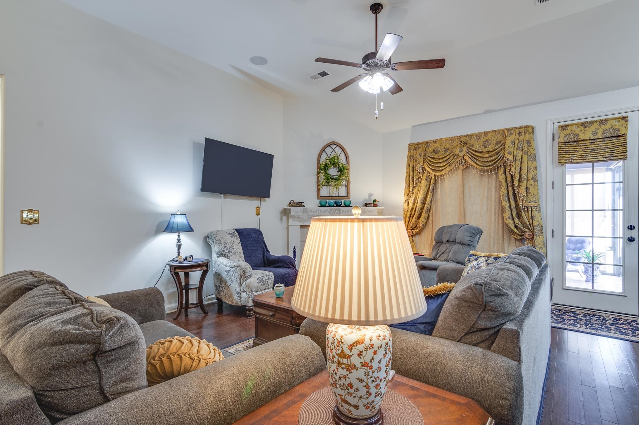 135 Chesnut Rdg Drive Oakland, TN 38060 - Photo 6 of 36 Living area with hardwood / wood-style flooring and ceiling fan