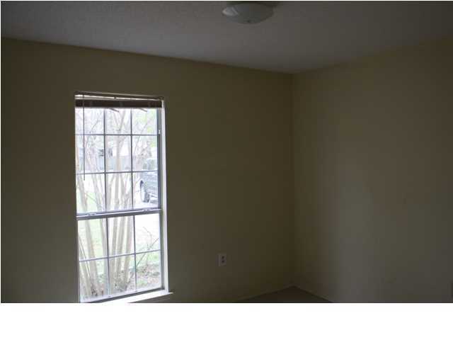 41 3rd Avenue Shalimar, FL 32579 - Photo 5 of 9 a black and white wall with a window