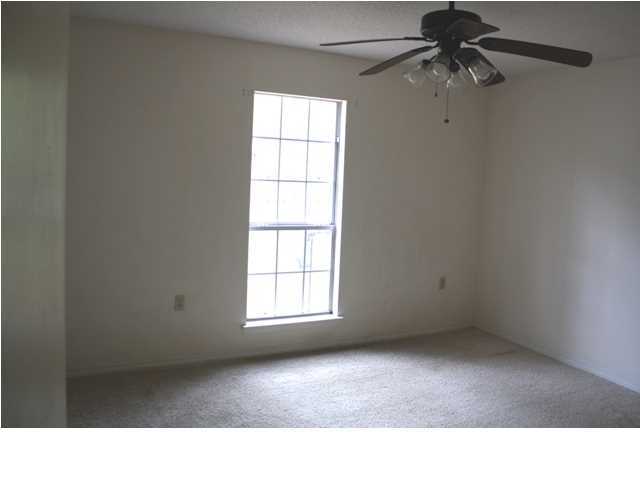 41 3rd Avenue Shalimar, FL 32579 - Photo 8 of 9 an empty room with windows and fan