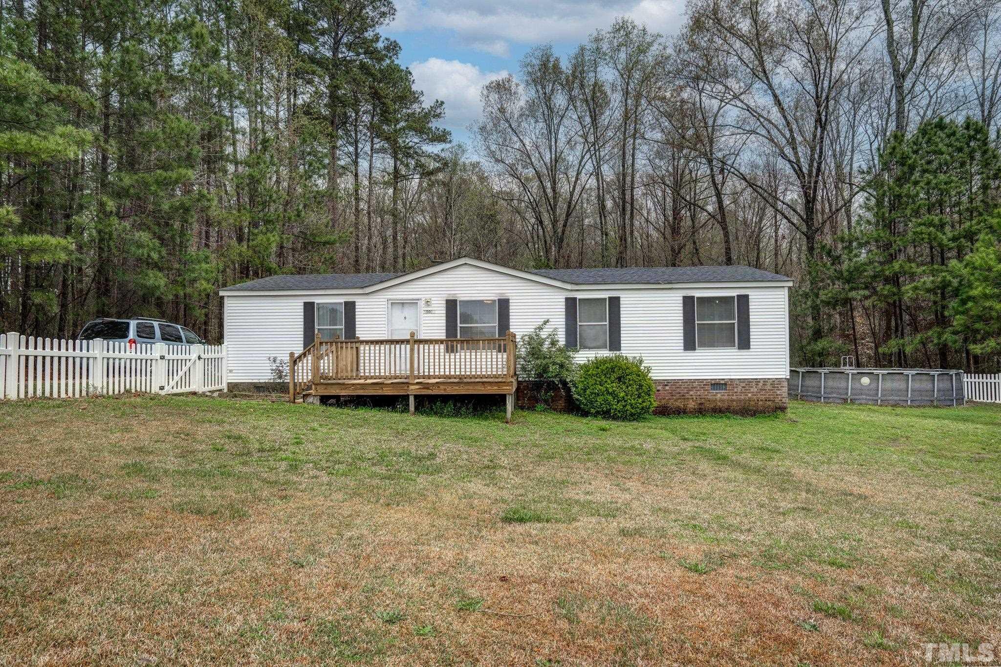 10014 Lake Royale Rd Spring Spring Hope, NC 27882 - Photo 1 of 26 a view of house with a backyard