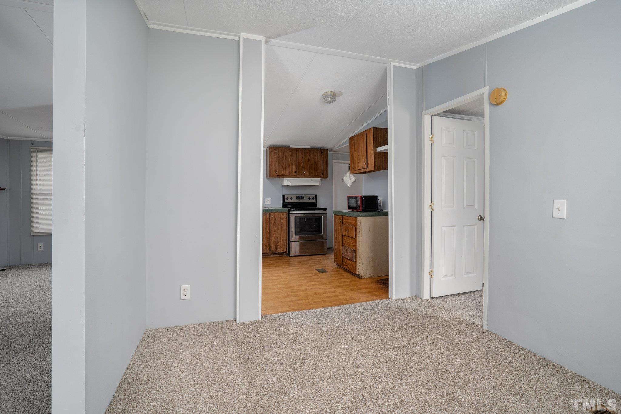 10014 Lake Royale Rd Spring Spring Hope, NC 27882 - Photo 13 of 26 a view of a kitchen with a refrigerator and a sink