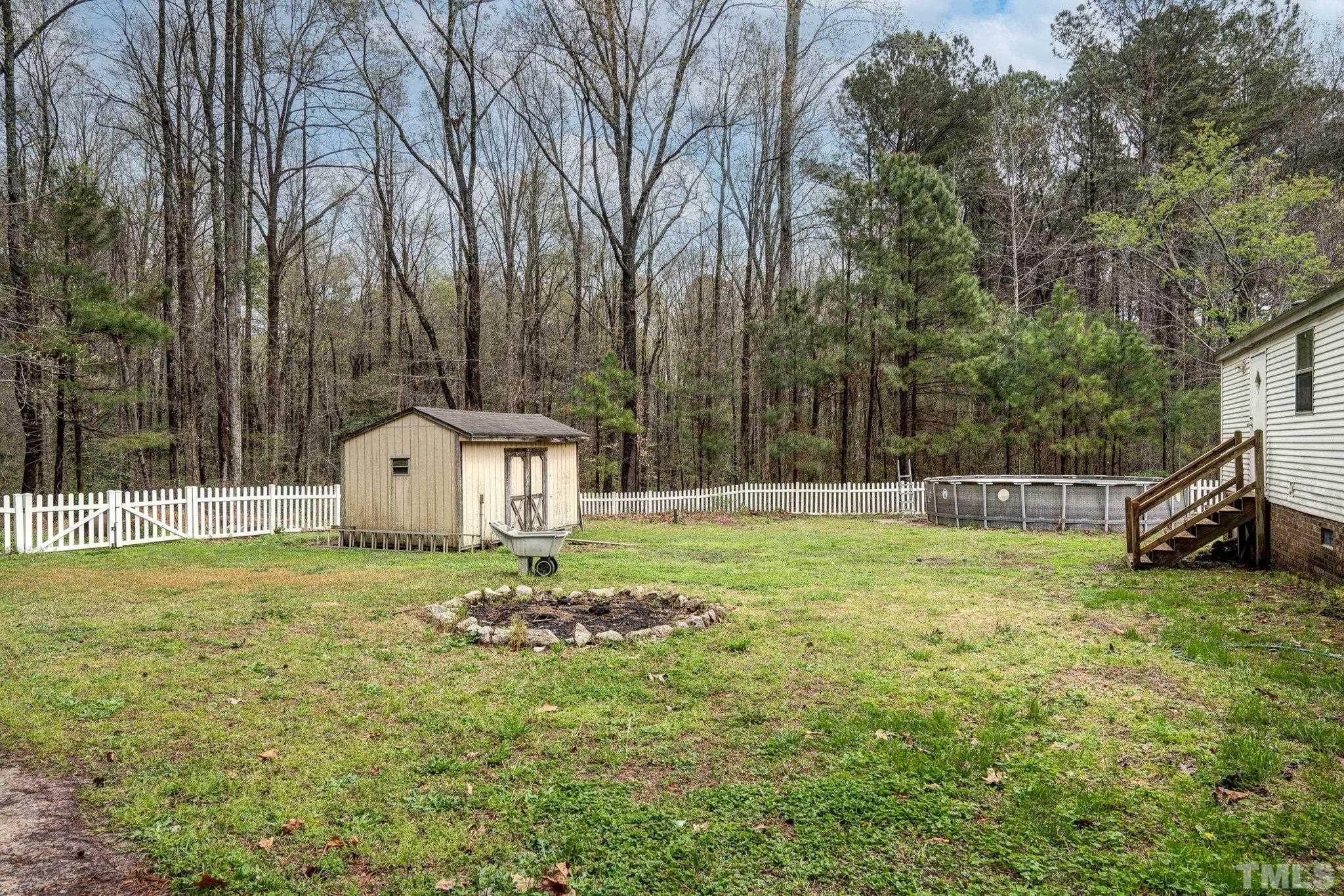 10014 Lake Royale Rd Spring Spring Hope, NC 27882 - Photo 26 of 26 a view of a house with a yard