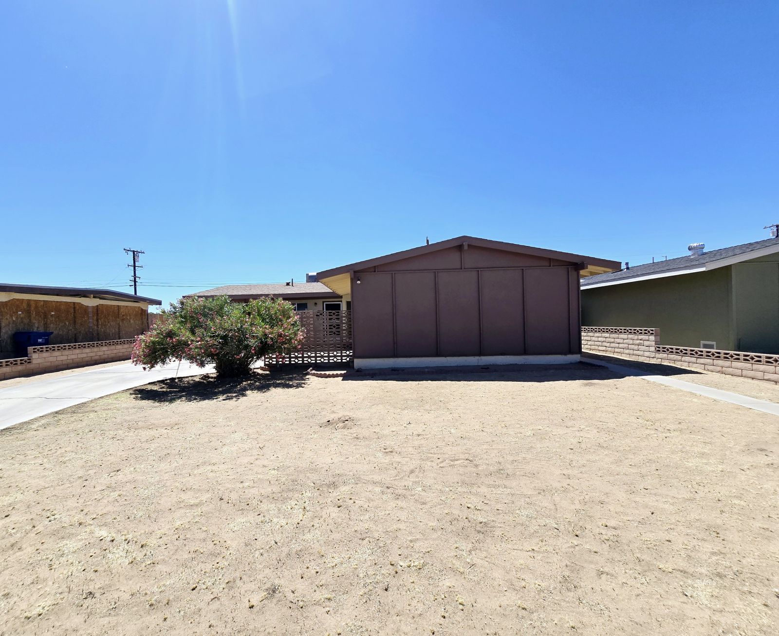 321 Lenore Street Ridgecrest, CA 93555 - Photo 2 of 20 a view of a house with a yard