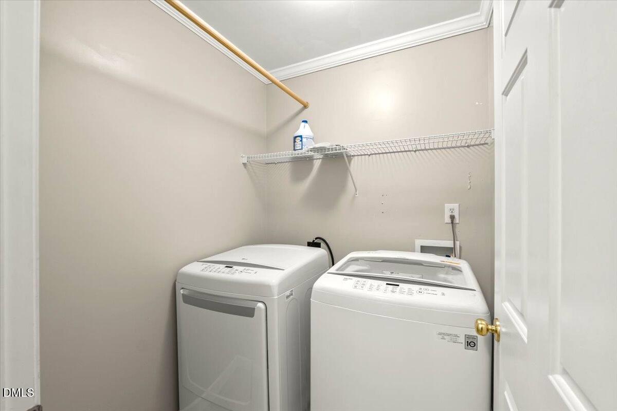 2621 Hamlet Green Drive Raleigh, NC 27614 - Photo 18 of 20 a utility room with dryer and washer