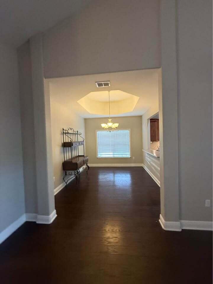 371 Symphony Way Freeport, FL 32439 - Photo 18 of 26 a view of empty room with wooden floor and fan