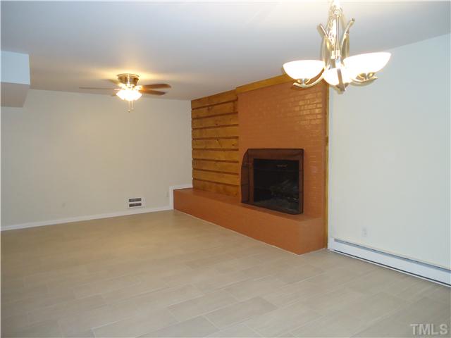 1533 Shadowood Lane Raleigh, NC 27612 - Photo 5 of 21 OPEN FAMILY ROOM /EAT-IN /KITCHEN AREA THAT IS HARD TO GET A GOOD VIEW. SCREEN PORCH IS OFF THE EAT-IN AREA. MASONRY FIRPLACE. NEW TILE FOR ENTIRE AREA.