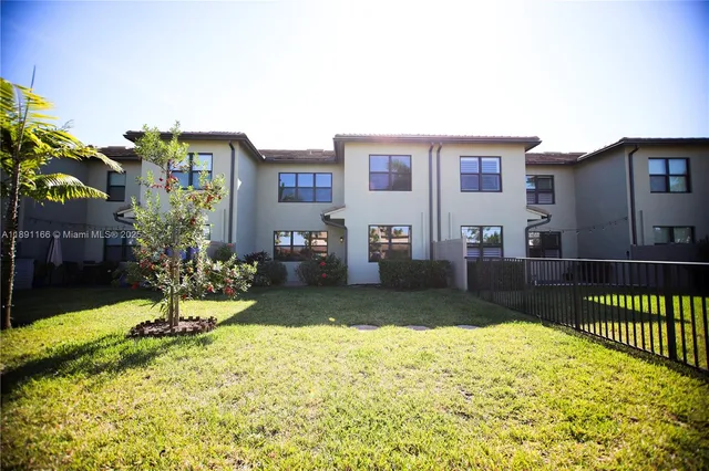 a spacious bathroom with a granite countertop sink mirror and double