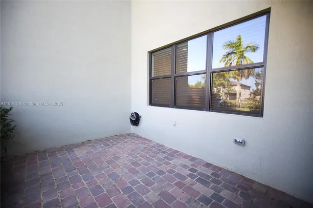 a bathroom with a shower and a toilet