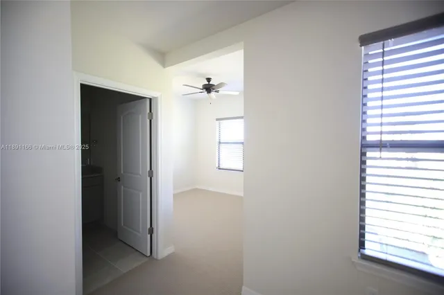 a bathroom with a bathtub and toilet
