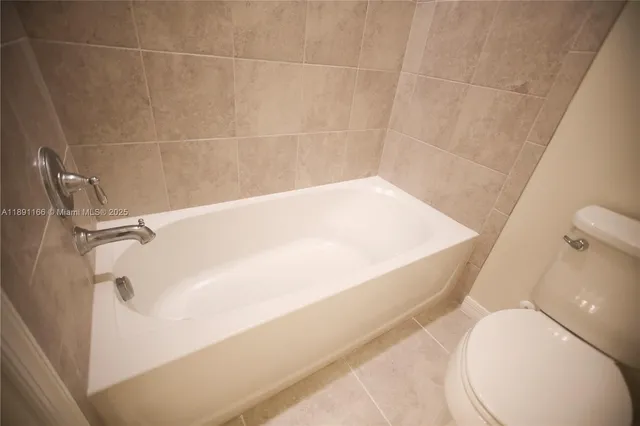 a view of outdoor space swimming pool and green space