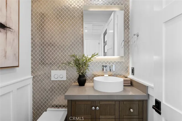 a view of sink with mirror