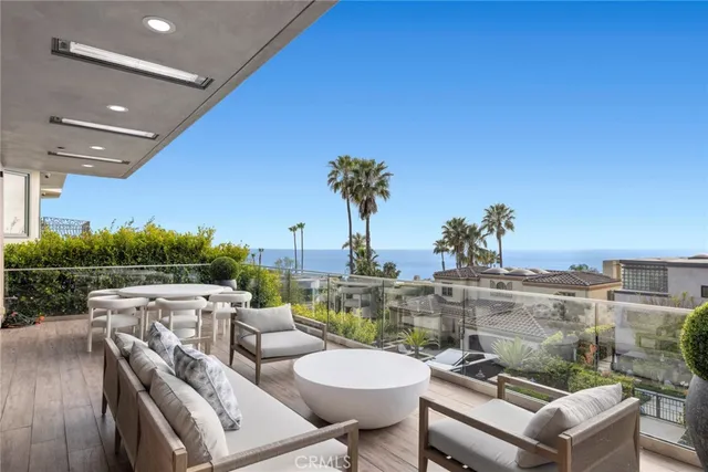 a view of a terrace with furniture and outdoor view