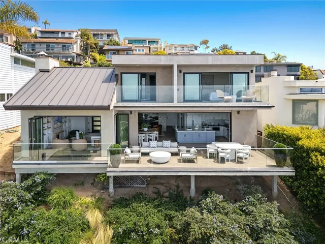 a view of house with outdoor seating