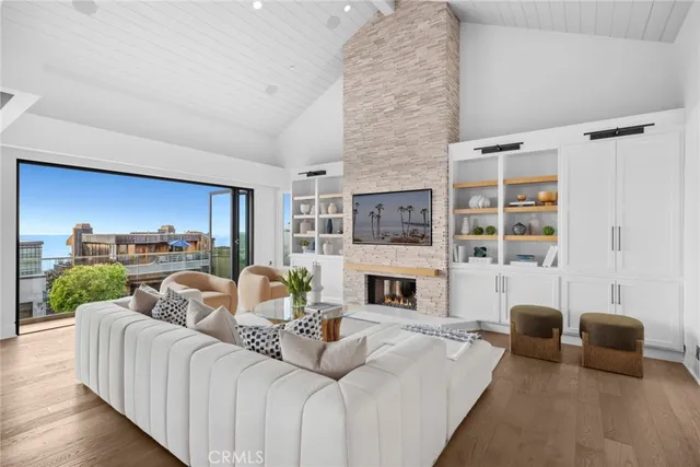 a bedroom with furniture and a fireplace