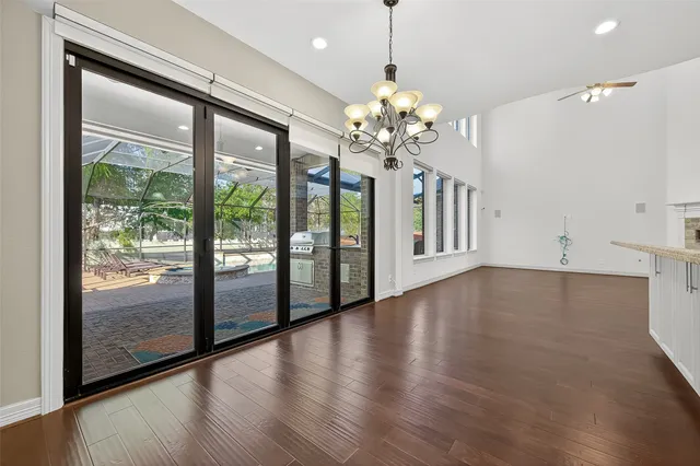 a view of an empty room with windows