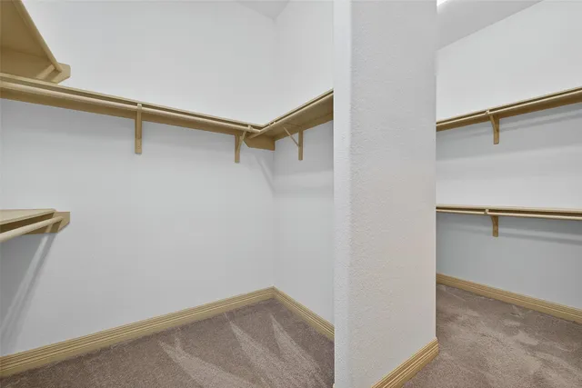 a living room with furniture pool table and flat screen tv