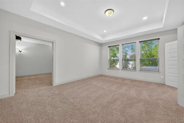 a view of a chairs and table in a patio