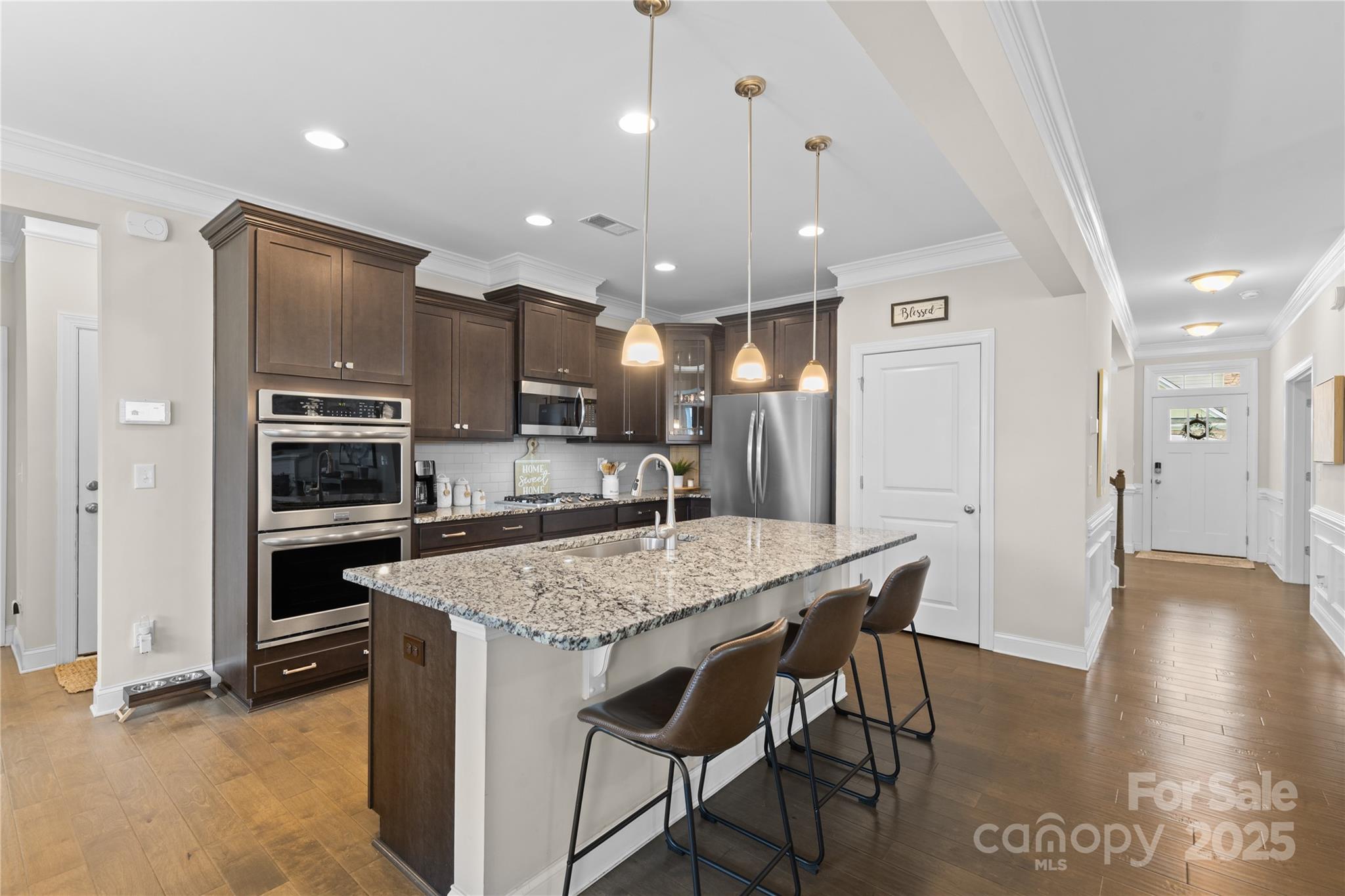 7035 Bareland Road Fort Mill, SC 29707 - Photo 12 of 47 a kitchen with a table and chairs in it