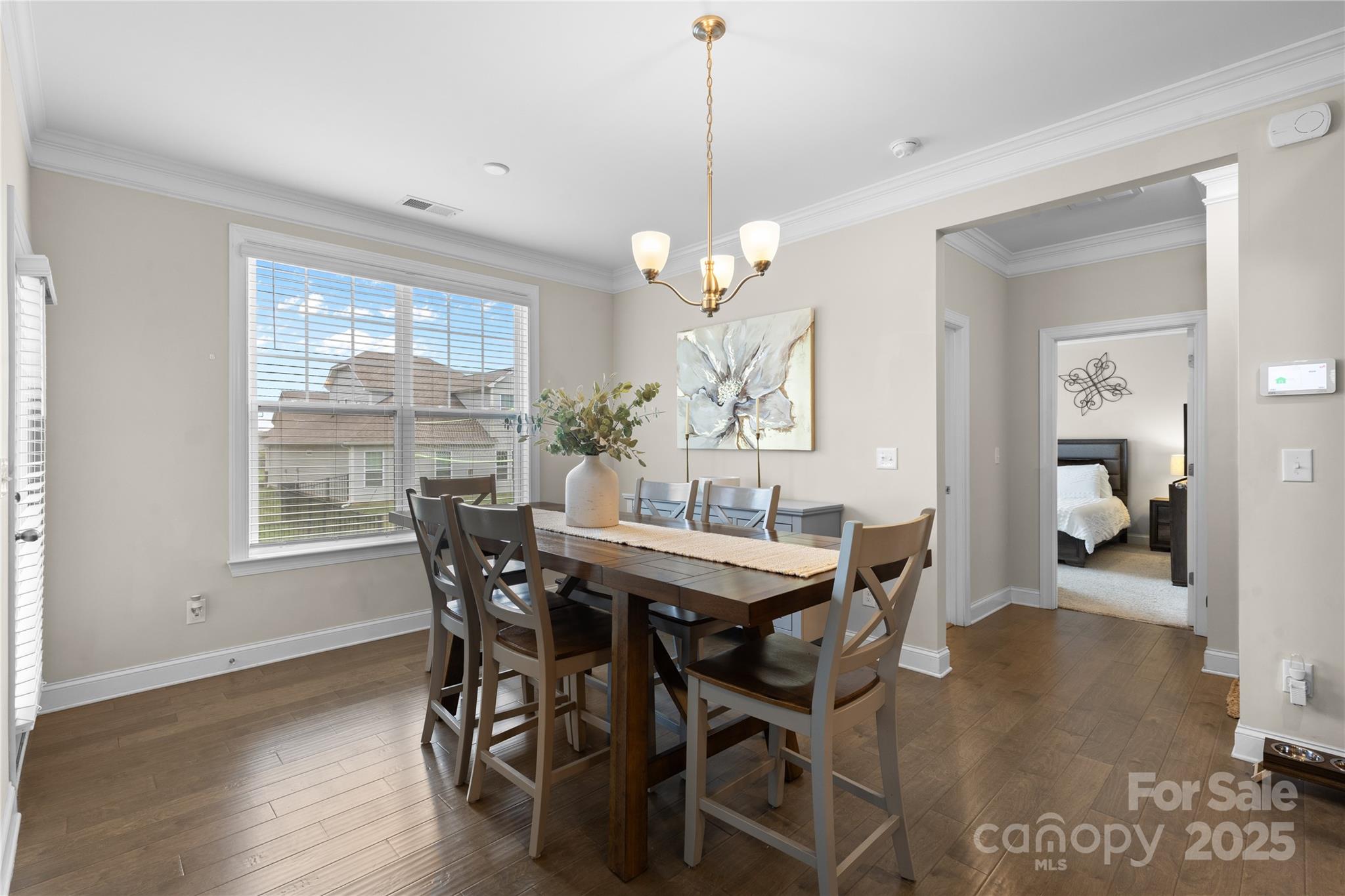 7035 Bareland Road Fort Mill, SC 29707 - Photo 14 of 47 a view of a dining room with furniture window and wooden floor