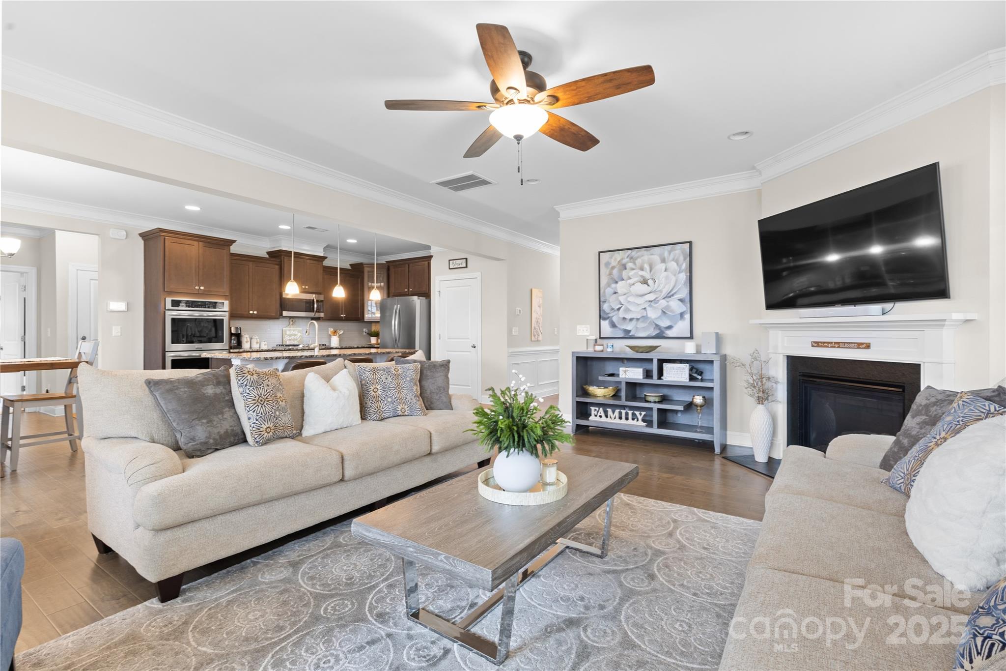 7035 Bareland Road Fort Mill, SC 29707 - Photo 19 of 47 a living room with furniture and a flat screen tv