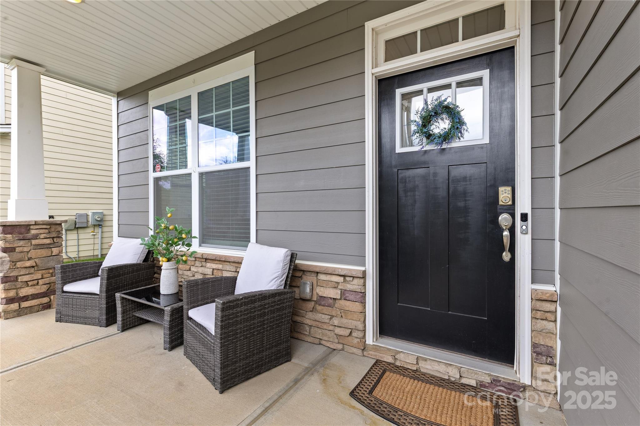 7035 Bareland Road Fort Mill, SC 29707 - Photo 3 of 47 a outdoor living space with furniture and a potted plant