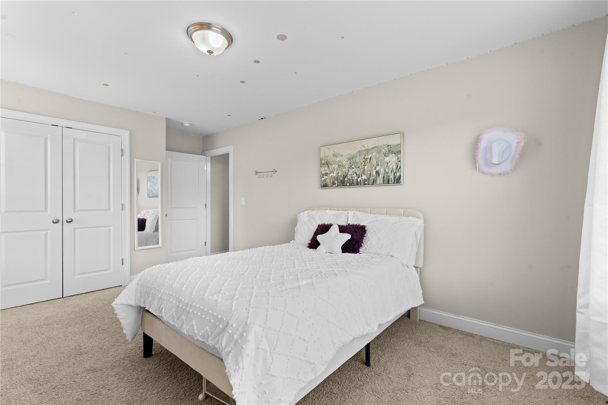 7035 Bareland Road Fort Mill, SC 29707 - Photo 33 of 47 a bedroom with a bed and a painting on the wall