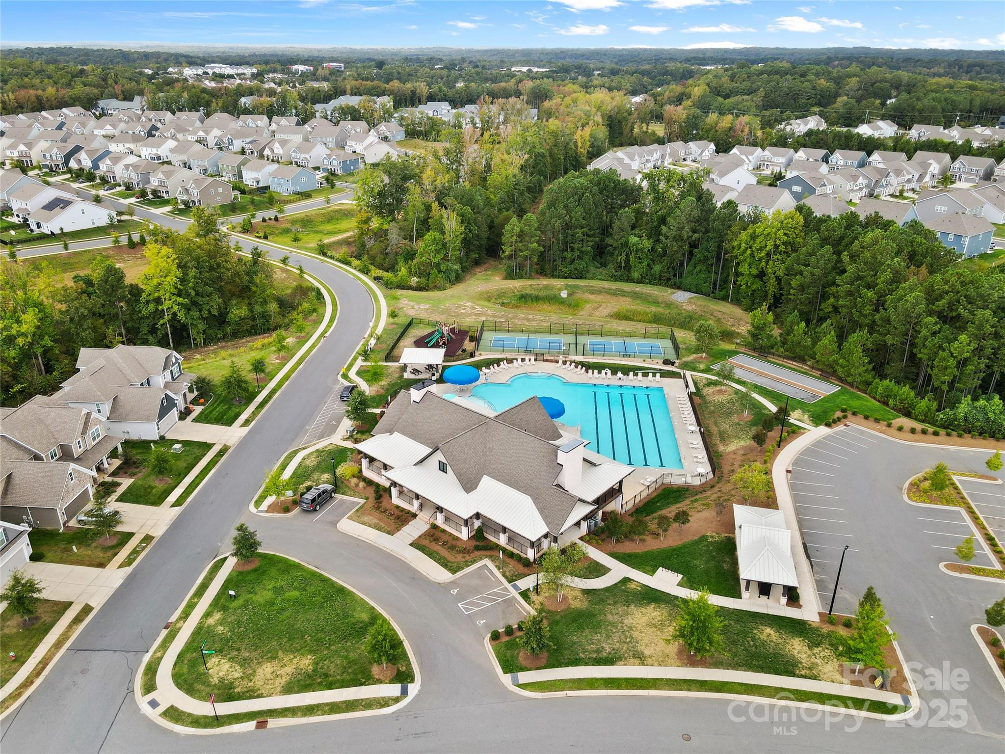 7035 Bareland Road Fort Mill, SC 29707 - Photo 43 of 47 an aerial view of a house with a swimming pool