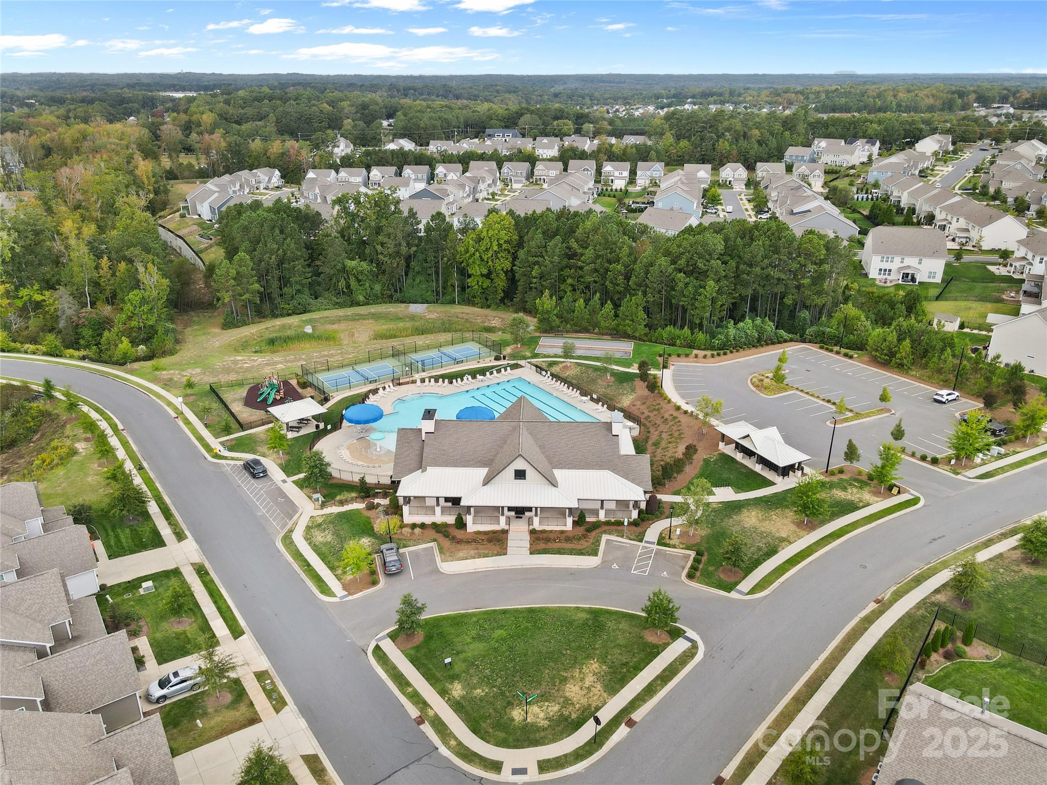 7035 Bareland Road Fort Mill, SC 29707 - Photo 44 of 47 an aerial view of residential houses with outdoor space