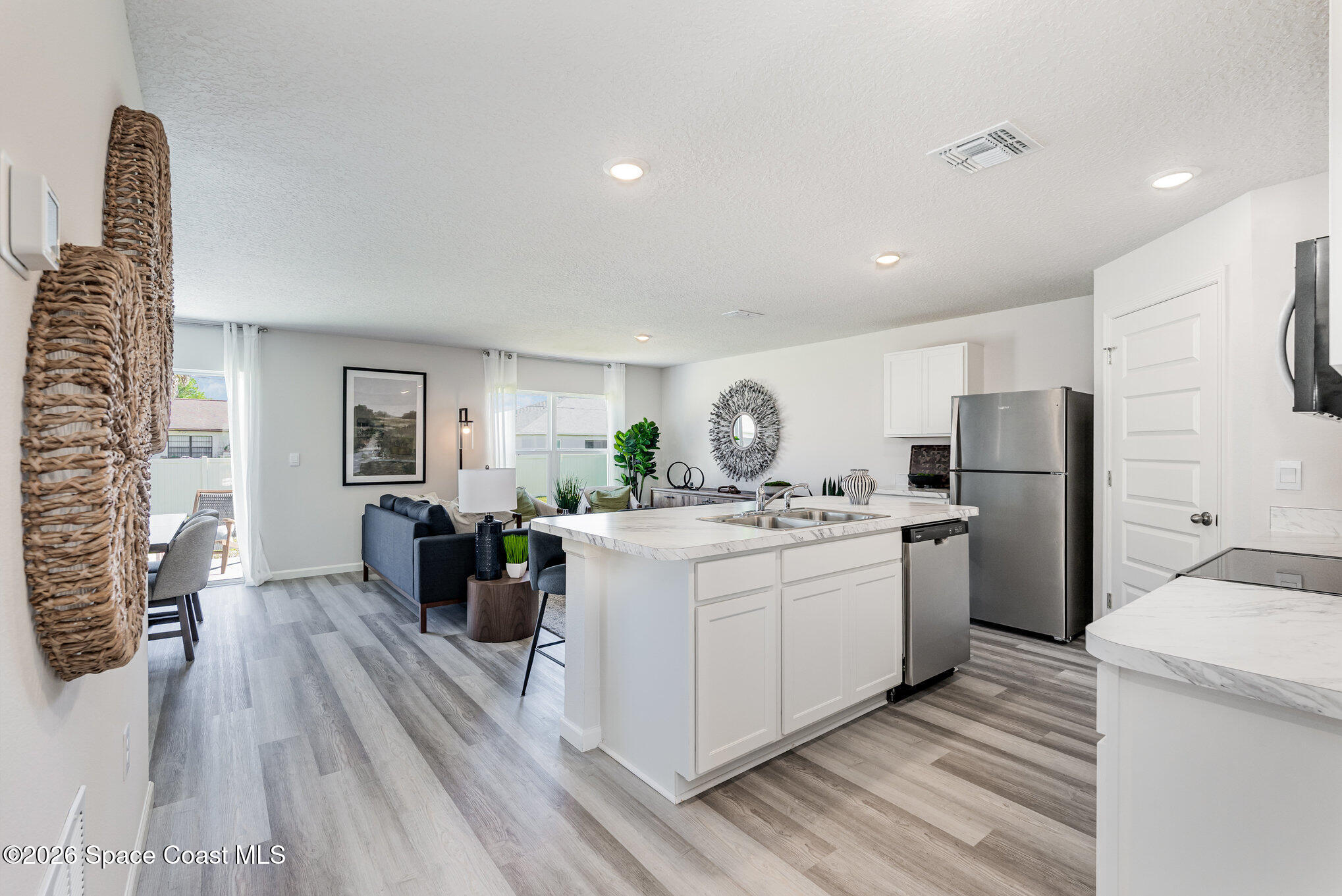 718 Novak Street Southwest Palm Bay, FL 32908 - Photo 5 of 24 008__amp3502-edit_340
