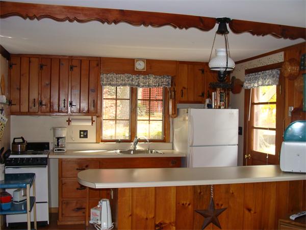 197 South Chesterfield Road Goshen, MA 01096 - Photo 12 of 29 a kitchen with a refrigerator and a sink