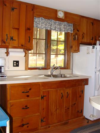197 South Chesterfield Road Goshen, MA 01096 - Photo 14 of 29 a bathroom with a sink a mirror and a window